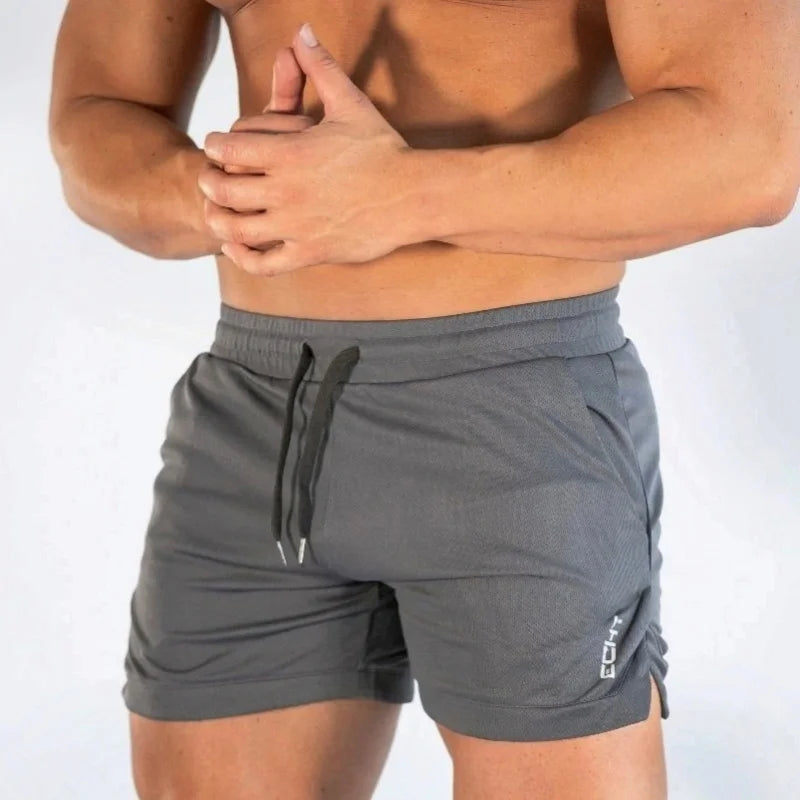 2025 NUEVOS pantalones cortos de entrenamiento de gimnasia para hombre, ropa deportiva informal para hombre, pantalones de playa con rejilla para correr, pantalones cortos transpirables de secado rápido para hombre