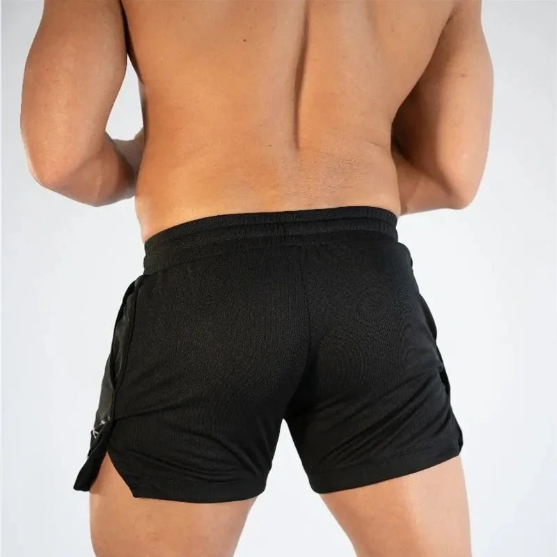 2025 NUEVOS pantalones cortos de entrenamiento de gimnasia para hombre, ropa deportiva informal para hombre, pantalones de playa con rejilla para correr, pantalones cortos transpirables de secado rápido para hombre