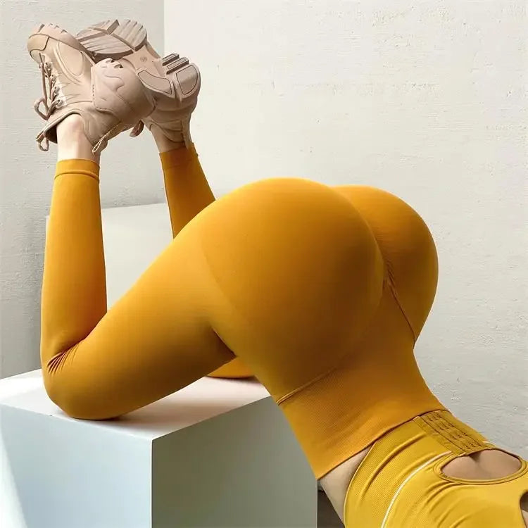 Mallas lisas de cintura alta para mujer, medias ajustadas sin costuras, mallas elásticas para Fitness y Yoga, pantalones de entrenamiento de gimnasio a la moda de punto con realce en el trasero