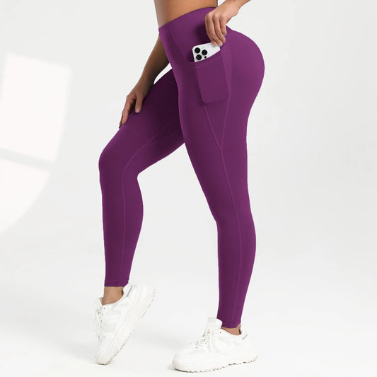 Leggings de cintura alta de Color sólido para mujer con bolsillos, pantalones deportivos informales para correr, entrenamiento y Yoga para todas las estaciones
